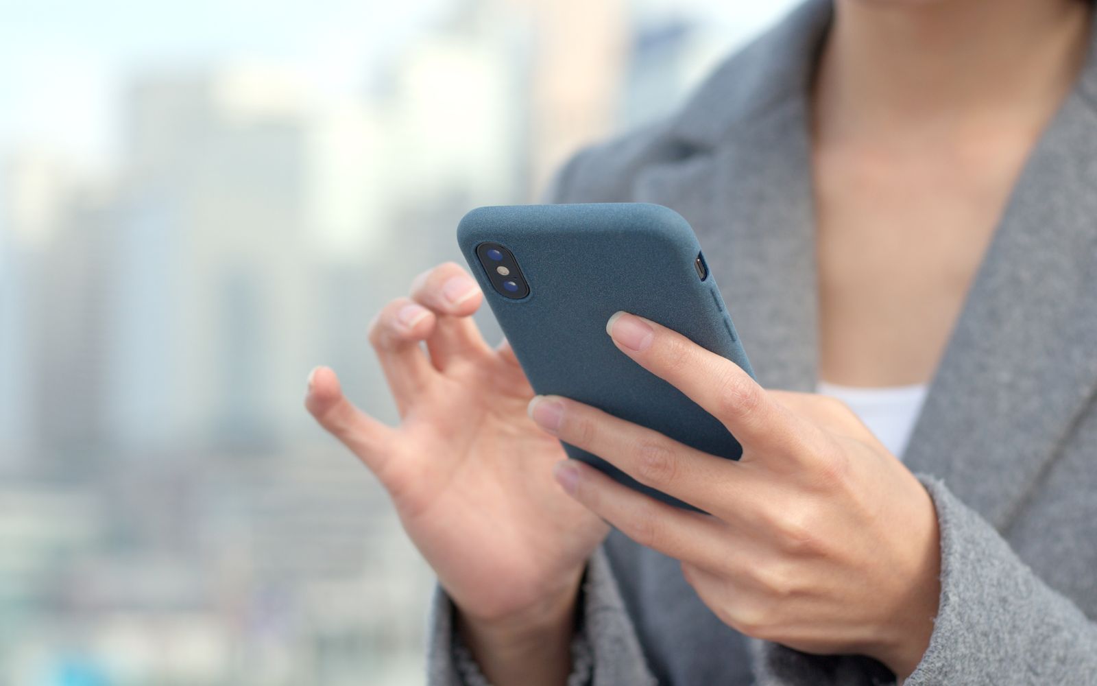 Person holding a phone. 