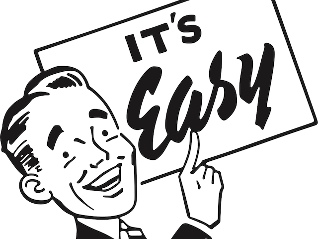 A man pointing at a sign that says It's easy