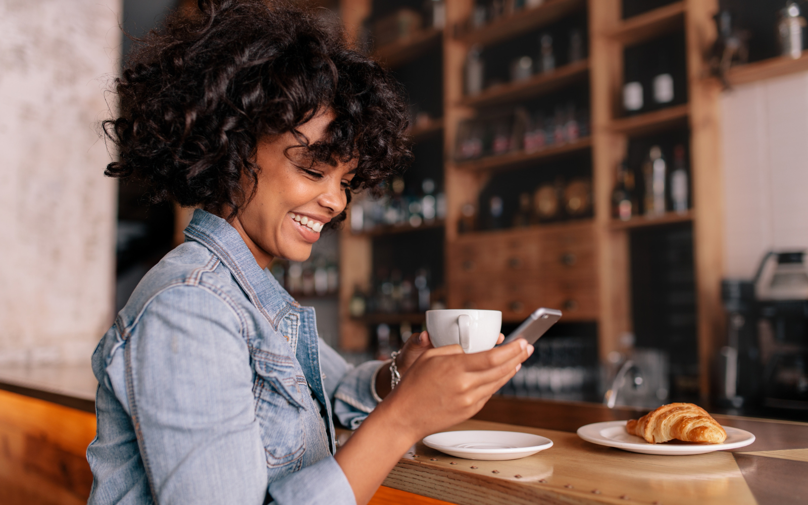 Customer checking loyalty rewards on their phone.